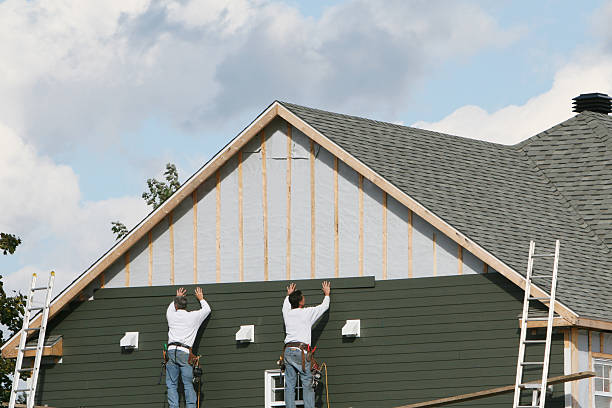 Professional Emergency Siding Repair technician working in East Liberty, OH